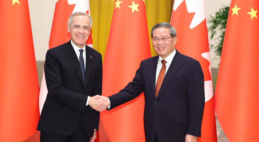 पेइचिंग में चीनी प्रधानमंत्री ने अपने कनाडाई समकक्ष से मुलाकात की